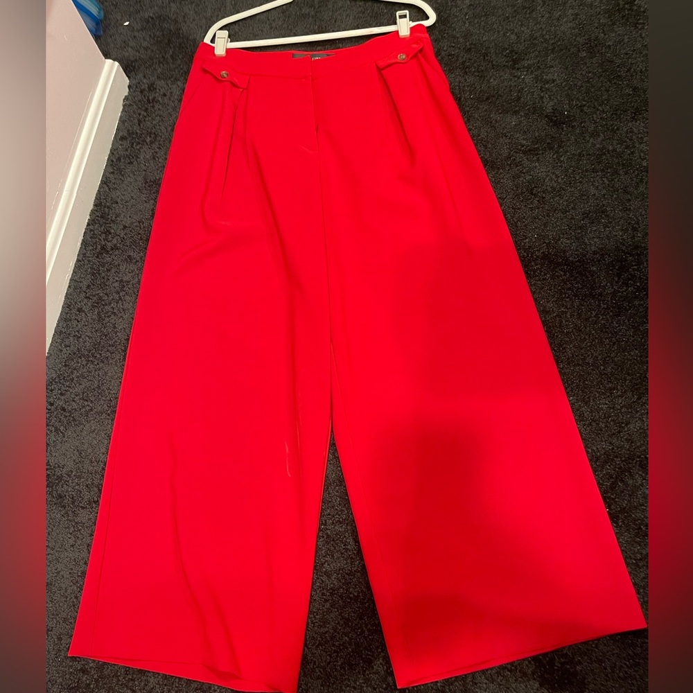 Gabriel Union. Wide leg red pants.